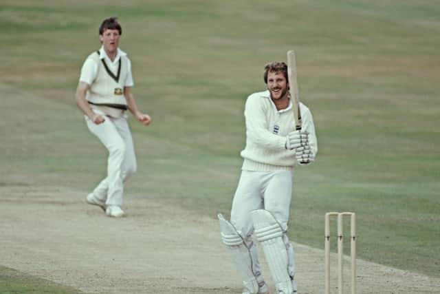Ian Botham smiles as he hits out off the bowling of Geoff Lawson during the second innings of the 3rd Cornhill Test match in July 1981. PIC: Getty