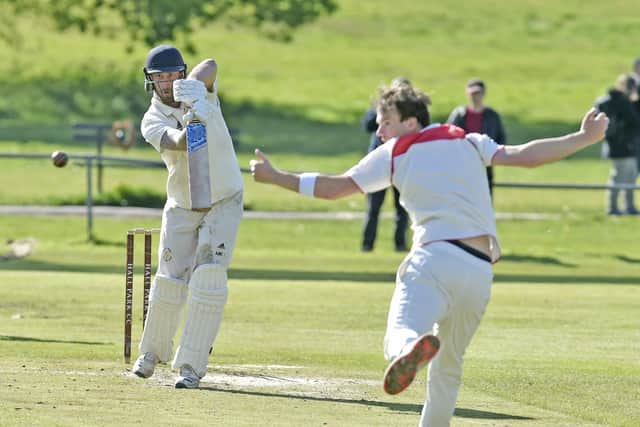 Hall Park opener Michael Kelsey who top scored with 38 drives four runs past Pool bowler David Amos in the Aire-Wharfe League on Saturday. Picture: Steve Riding.