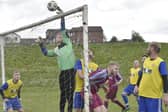 Stanningley OB Res goalkeeper Brad Longthorpe tips the ball over for a corner in the 2-0 defeat to Norristhorpe Rangers who hold a nine-point lead at the top of the Division 3 table. Picture: Steve Riding.