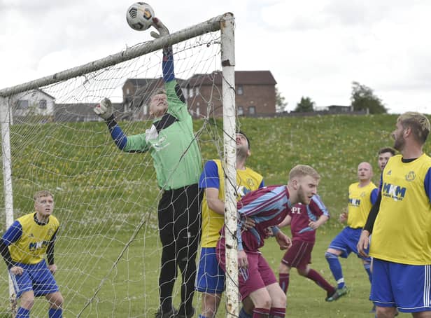Stanningley OB Res goalkeeper Brad Longthorpe tips the ball over for a corner in the 2-0 defeat to Norristhorpe Rangers who hold a nine-point lead at the top of the Division 3 table. Picture: Steve Riding.