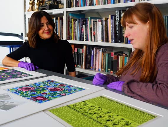 Gallery professional Chelsea Cefai (left) pictured with Natalie Raw, Leeds Museums and Galleries curator of dress and textiles.