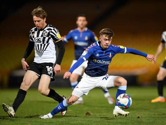 DIFFERENT PLAYER - Alfie McCalmont has developed at Oldham Athletic in the 'muck and bullets' of League Two says Northern Ireland boss Ian Baraclough. Pic: Getty