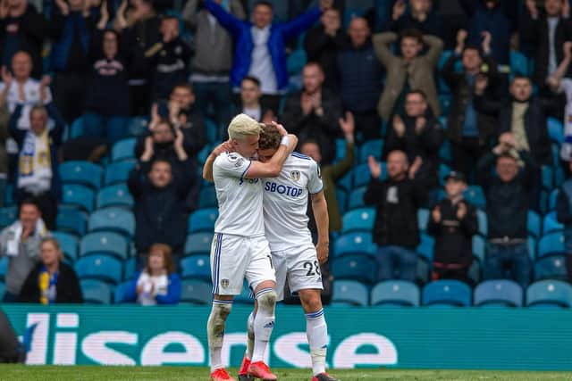 EMOTIONAL FANFARE - Gjanni Alioski's good friends and team-mates Gaetano Berardi and Pablo Hernandez had standing ovations as they left Leeds United on Sunday. Pic: Bruce Rollinson