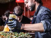 Mark White, the founder of Leeds street food eatery Rola Wala