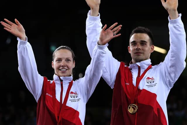 England's Gabby Adcock and Chris Adcock with their gold medals won at the 2014 Commonwealth Games.  Picture: Andrew Milligan/PA Wire.