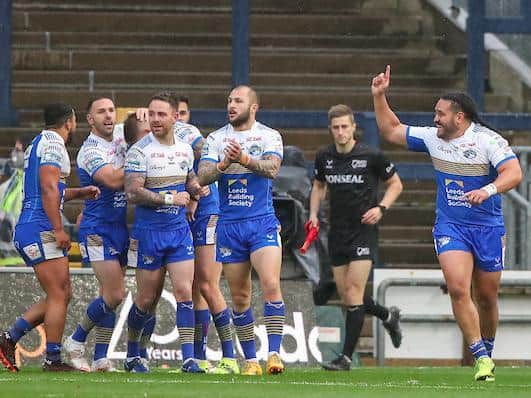 Rhinos celebrate their opening try against Hull - but boss Richard Agar says their attack need to be much better tonight. Picture by Alex Whitehead/SWpix.com.