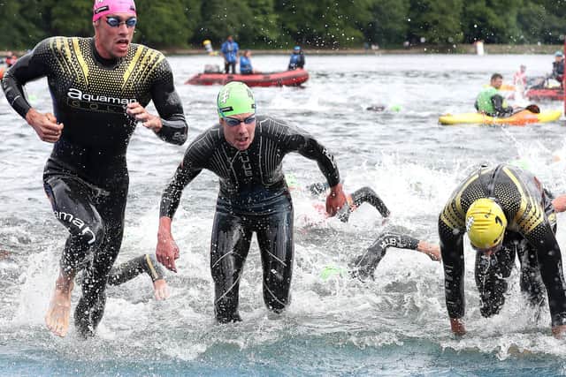 Splashing out: Alistair Brownlee, second left, exits the water during the 2019 ITU World Triathlon Series Event in Leeds.