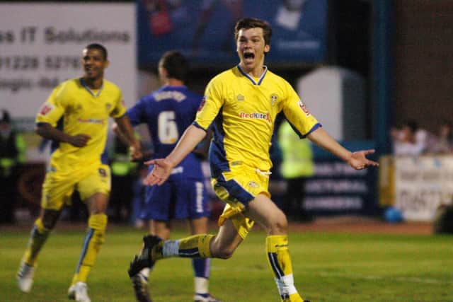 WE'VE DONE IT! Nineteen-year-old Leeds United midfielder Jonny Howson celebrates his 90th-minute strike at Carlisle United of May 2008 which booked a date in the League One play-off final. Picture by Steve Riding.
