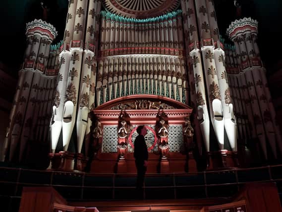 Leeds City Organist Darius Battiwalla pictured with the organ at Leeds Town Hall.
Picture: Simon Hulme.