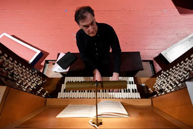 Darius Battiwalla plays the historic organ in Leeds Town Hall. Picture: Simon Hulme.