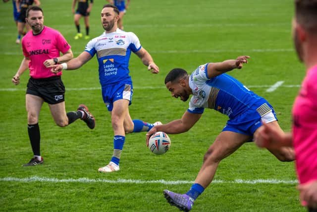 Kruise Leeming scores for Rhinos in their big win at Castleford. Picture by Bruce Rollinson.