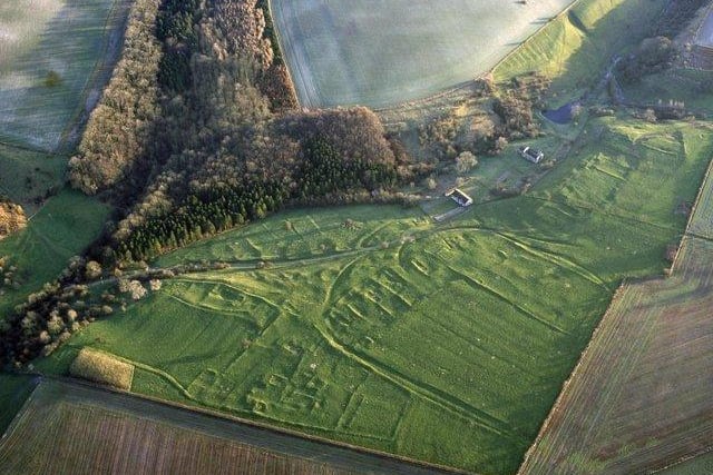 This unmanned site in the Wolds is a deserted medieval village. It was abandoned in the 16th century to make way for sheep grazing, but the church, field patterns and some foundations remain.
