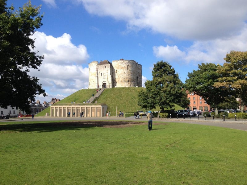 The tower is the remains of what was once the Norman keep of York Castle. A major explosion in 1684 destroyed the defences, and afterwards it was used as a prison until 1929.