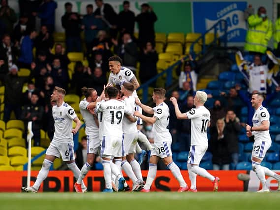 FLYING HIGH: The Whites celebrate after Kalvin Phillips nets in the season finale against West Brom. Photo by Jon Super - Pool/Getty Images.
