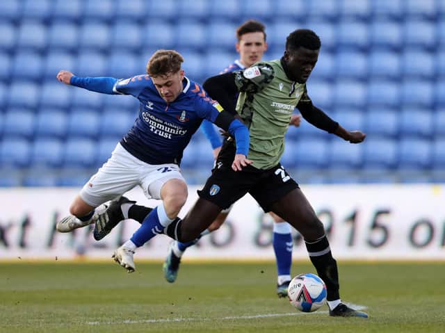 Leeds United loanee Alfie McCalmont (L) in action against Colchester. Pic: Getty