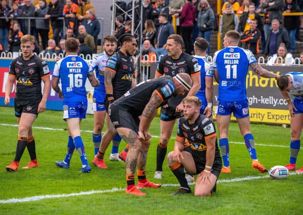 George Griffin and Danny Richardson show their fustration during Castleford Tigers's 60-6 defeat to Leeds Rhinos on Friday. Picture: Bruce Rollinson.