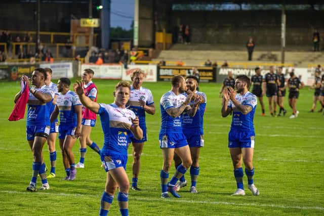 Rhinos celebrate their win at the Jungle. Picture by Bruce Rollinson.