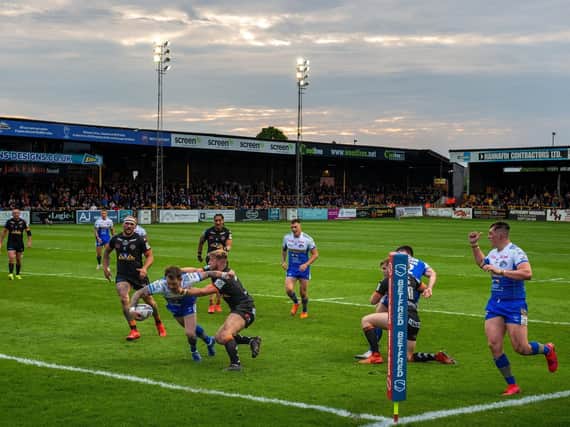 Richie Myler heads for the line in Rhinos' big win at the Jungle. Picture by Bruce Rollinson.