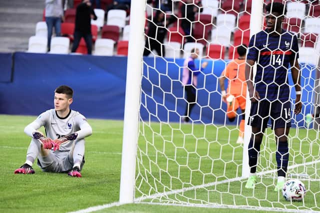 LATE DESPAIR: For Leeds United goalkeeper Illan Meslier, left, and France's under-21s after defeat to the Netherlands in Budapest. Photo by ATTILA KISBENEDEK/AFP via Getty Images.
