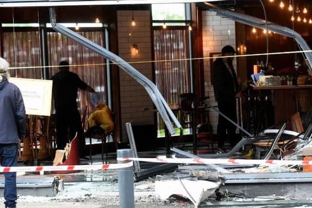 The damage caused to Zucco Italian restaurant in Meanwood, Leeds, after a car crashed into it shortly before 3.30am on Tuesday, May 25