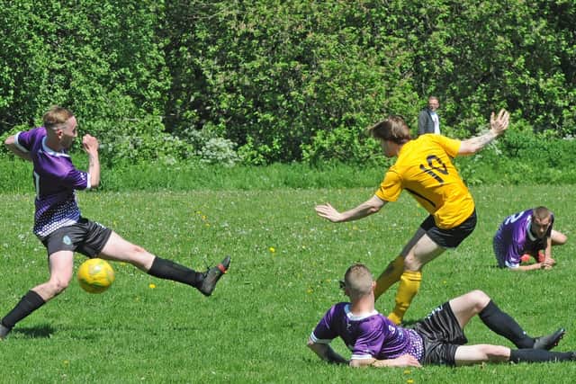 Max Bullard scores the third for North Leodis in the 3-0 win at Bramley Amateurs. Picture: Steve Riding.