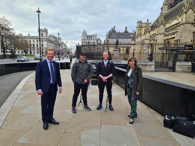 Pictured from left to right: Robbie Moore MP, Wharfe Walkers Patrick Godden and Jack Hanson, and Environment Minister Rebecca Pow MP, outside the Houses of Parliament.