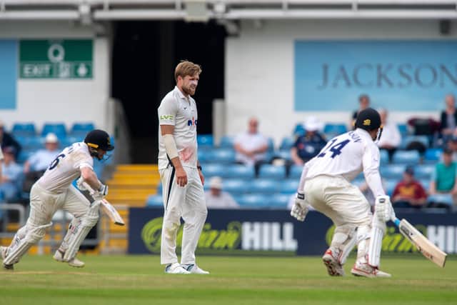 On the back foot: Yorkshire's David Willey watches as Aaron Thomason and Ben Brown pile on more runs during their 107-run partnership. Picture Bruce Rollinson
