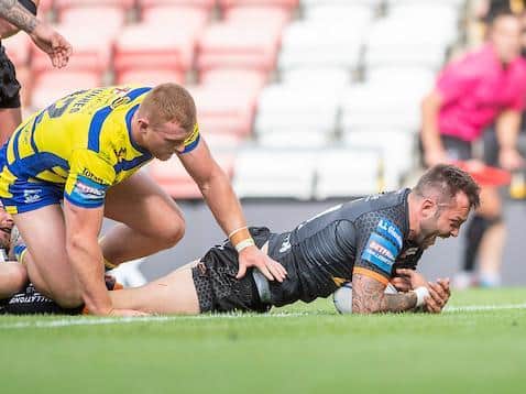 Gareth O'Brien goes over for Tigers' opening try. Picture by Alex