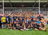 Tigers' squad celebrate with their fans after the semi-final win. Picture by