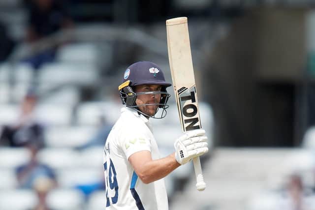 RUN MACHINE: Yorkshire's 
Dawid Malan celebrates getting to 150 on day three against Sussex at Headingley. Picture by John Clifton/SWpix.com