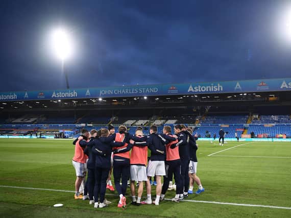 Leeds United players huddle at Elland Road ahead of kick-off. Pic: Getty