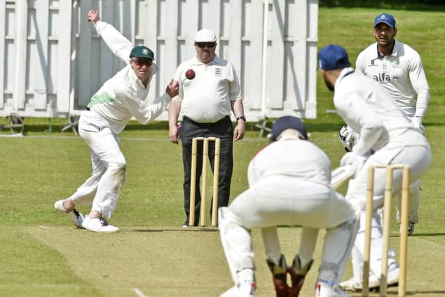 John Heath bowls for Pool in their four-wicket win over New Rover. Picture: Steve Riding.