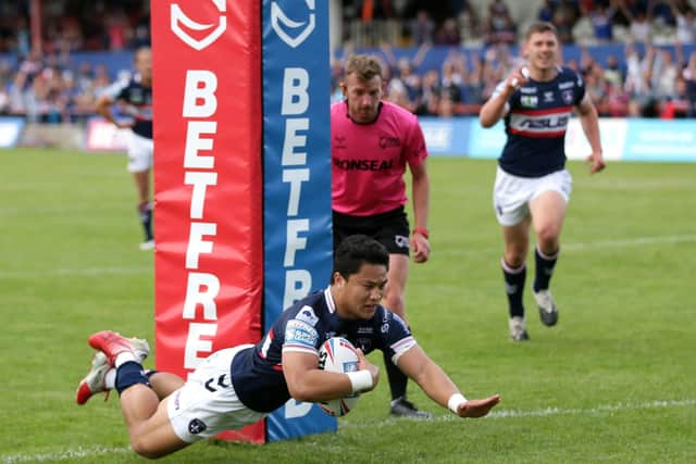 Wakefield Trinity's Mason Lino (left) scores their side's fifth try of the Betfred Super League match against Leigh Centurions at the Mobile Rocket Stadium, Wakefield. Picture: Richard Sellers/PA Wire.