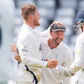 Lethal combination: Yorkshire spinner Dom Bess, left, saw colleague  Adam Lyth take three catches off his bowling to help the White Rose to an inniings and 30-run victory over Sussex. Picture: Allan McKenzie/SWpix.com