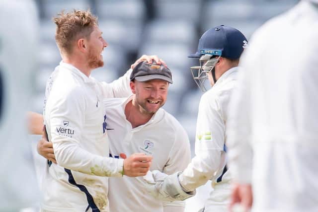 Lethal combination: Yorkshire spinner Dom Bess, left, saw colleague  Adam Lyth take three catches off his bowling to help the White Rose to an inniings and 30-run victory over Sussex. Picture: Allan McKenzie/SWpix.com