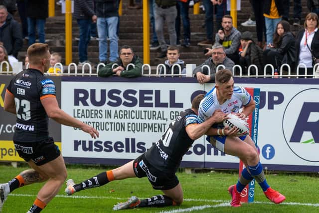 Jack Broadbent crosses the whitewash for Rhinos at Castleford. Picture by Bruce Rollinson.