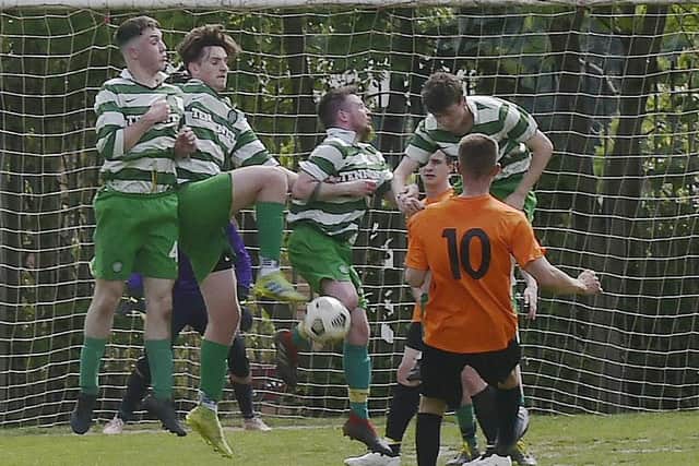 The Mount St Marys Reserves' wall does its job during Saturday's Division 4 encounter at Farnley Sports. Picture: Steve Riding.