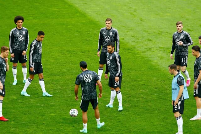 BENCH VIEWING: For Leeds United defender Robin Koch, second right, pictured as Germany warm up for Monday night's friendly against Latvia in Dusseldorf. Photo by THILO SCHMUELGEN/POOL/AFP via Getty Images.