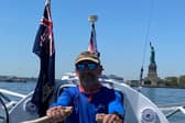 Ian Rivers leaves the backdrop of New York with the Statue of Liberty in the background.