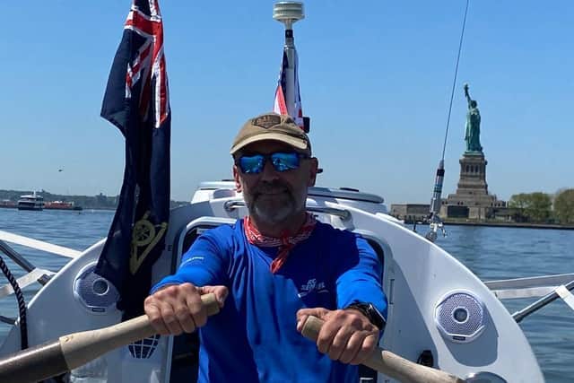 Ian Rivers leaves the backdrop of New York with the Statue of Liberty in the background.