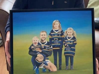 Brent Sheldon said it was an "honour and a privilege" to paint the artwork - showing Burrow alongside his family - before taking it to his parent's home last week.