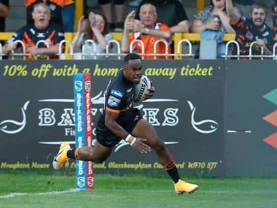 Tigers debutant Jason Qareqare scores with his first touch against Hull. Picture by Ed Sykes/SWpix.com.