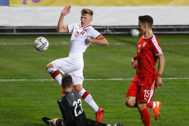 DEVELOPING: Leeds United's Mateusz Bogusz, left, pictured in action for Poland's under-21s against Serbia under-21s in the Euro Under-21s qualifier at FK Metalac last October. Photo by Srdjan Stevanovic/Getty Images.