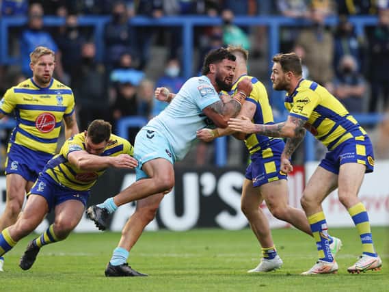 Dave Fuifita on the attack for Trinity against Warrington. Picture by Paul Currie/SWpix.com.