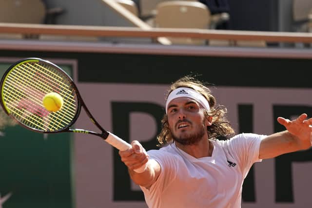 GOING THROUGH: Stefanos Tsitsipas slams a forehand to Alexander Zverev during their semi-final. Picture: AP/Michel Euler