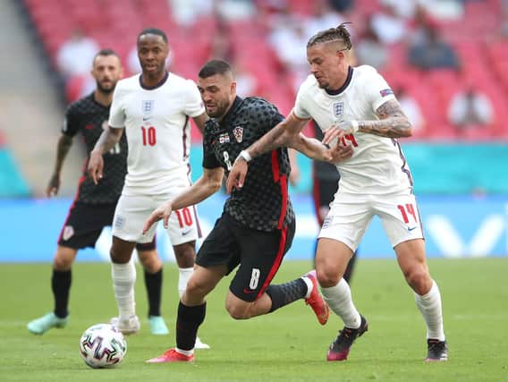 Croatia's Mateo Kovacic (left) and England's Kalvin Phillips battle for the ball during the UEFA Euro 2020 Group D match at Wembley Stadium, London. Picture date: Sunday June 13, 2021 (photo: PA).