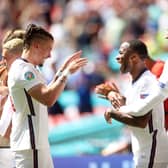England's Raheem Sterling celebrates with Kalvin Phillips after scoring the winner against Croatia. Photos: Getty Images