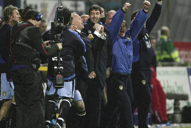 ON OUR WAY: Leeds United boss Kevin Blackwell, centre, and the Whites bench celebrate the 2-0 victory at Preston North End of May 2006 which sealed a place in the Championship play-off final. Photo by Alex Livesey/Getty Images.