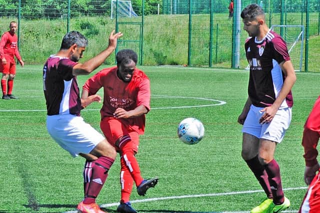 Yusef Tashani, of Leeds Independent, shoots at Athletico Reserves, who won this Yorkshire Amateur Division 1 contest, 3-2. Picture: Steve Riding.
