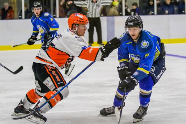 Ross Kennedy, left, battles with Leeds Chiefs' Adam Barnes during the 2019-20 NIHL National season. Picture courtesy of Mark Ferriss.